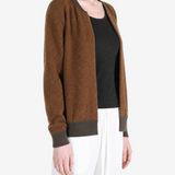 Brown jacket worn by a person, showing the jacket fit