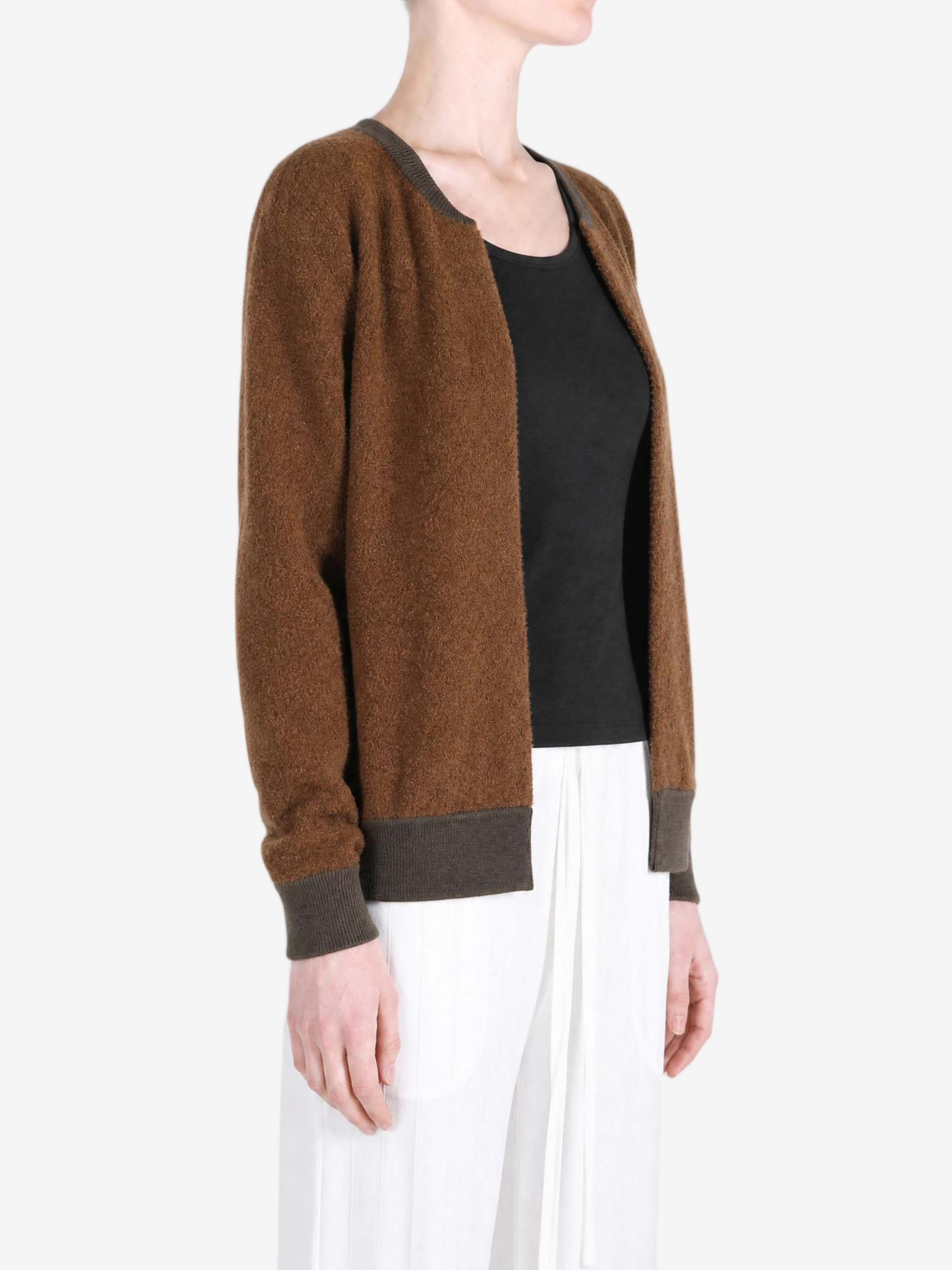 Brown jacket worn by a person, showing the jacket fit