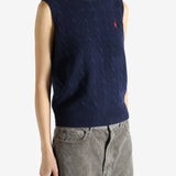 Navy sweater worn by a person, showing the sweater's fit