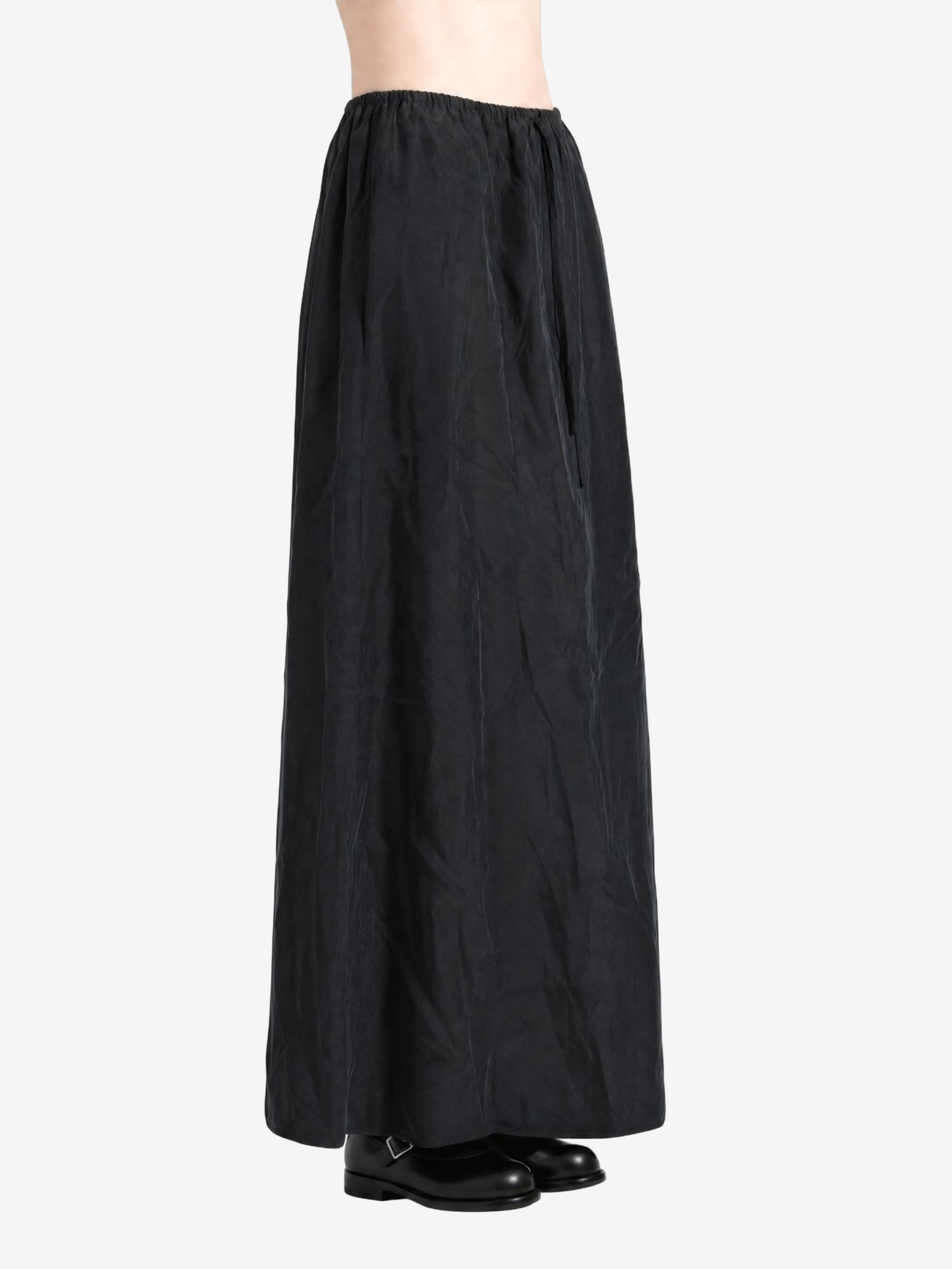 Black skirt worn by a person, showing the skirt fit