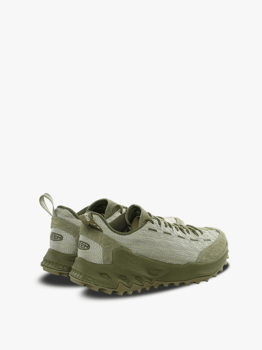 Green sneakers, back view