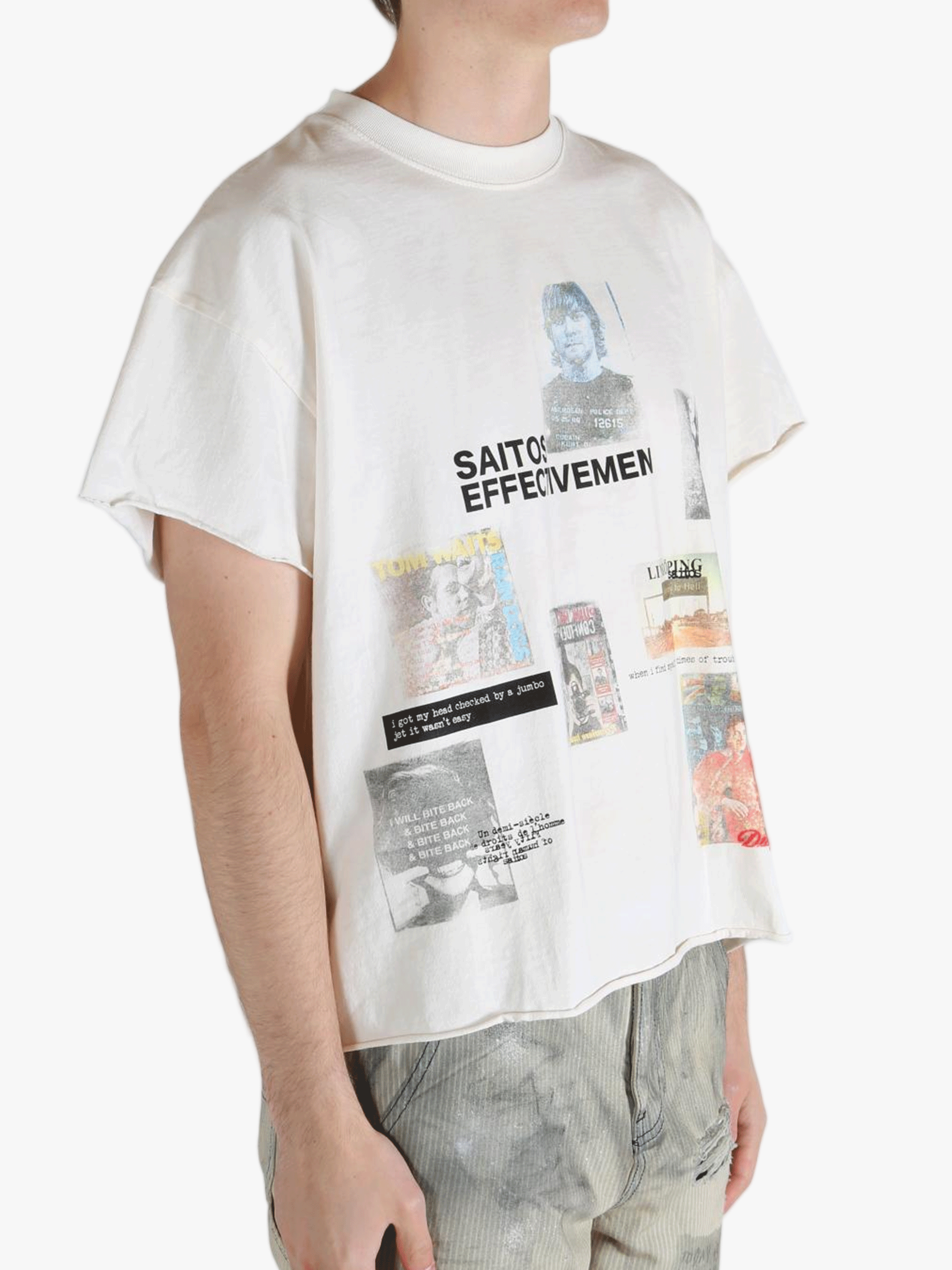 White t-shirt worn by a person, showing the shirt's fit