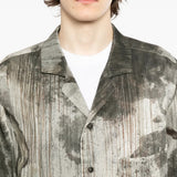 Close up of grey shirts, showing texture of the silk fabric