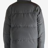 Grey jacket worn by a person, showing the jacket's fit