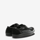 black sneakers, side view