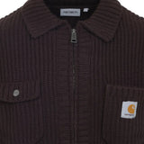 Close up of brown jackets, showing texture of the acrylic and wool and nylon fabric