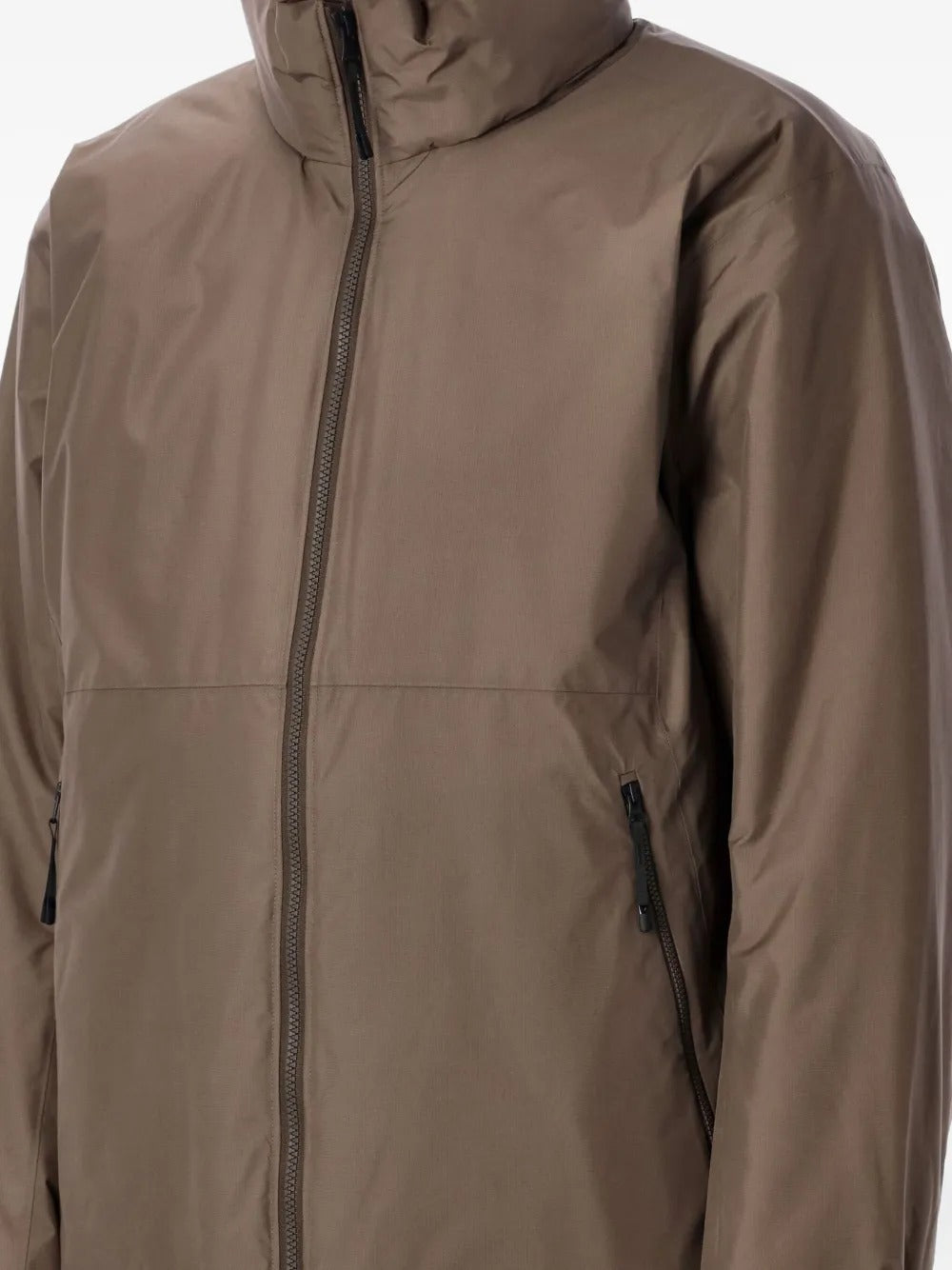 Close up of brown jackets, showing texture of the nylon and recycled polyester marine fabric
