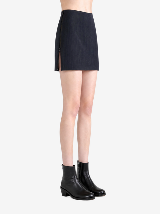 Black skirt worn by a person, showing the skirt fit