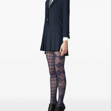 navy dress worn by a person, showing the dress fit