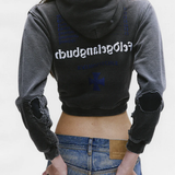 black hoodie,worn by a person,showing the hoodie fit