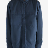 Navy jacket worn by a person, showing the jacket's fit