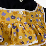 Cloes up of yellow top, showing texture of the cotton fabric