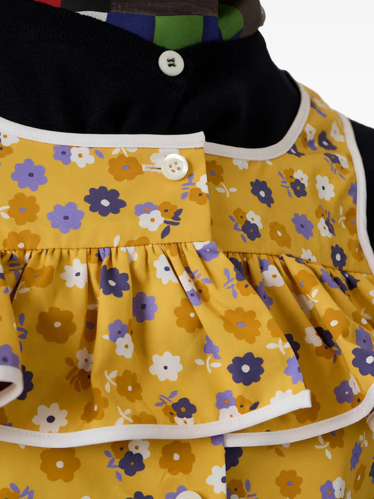Cloes up of yellow top, showing texture of the cotton fabric