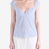 Blue t-shirt worn by a person, showing the t-shirt fit