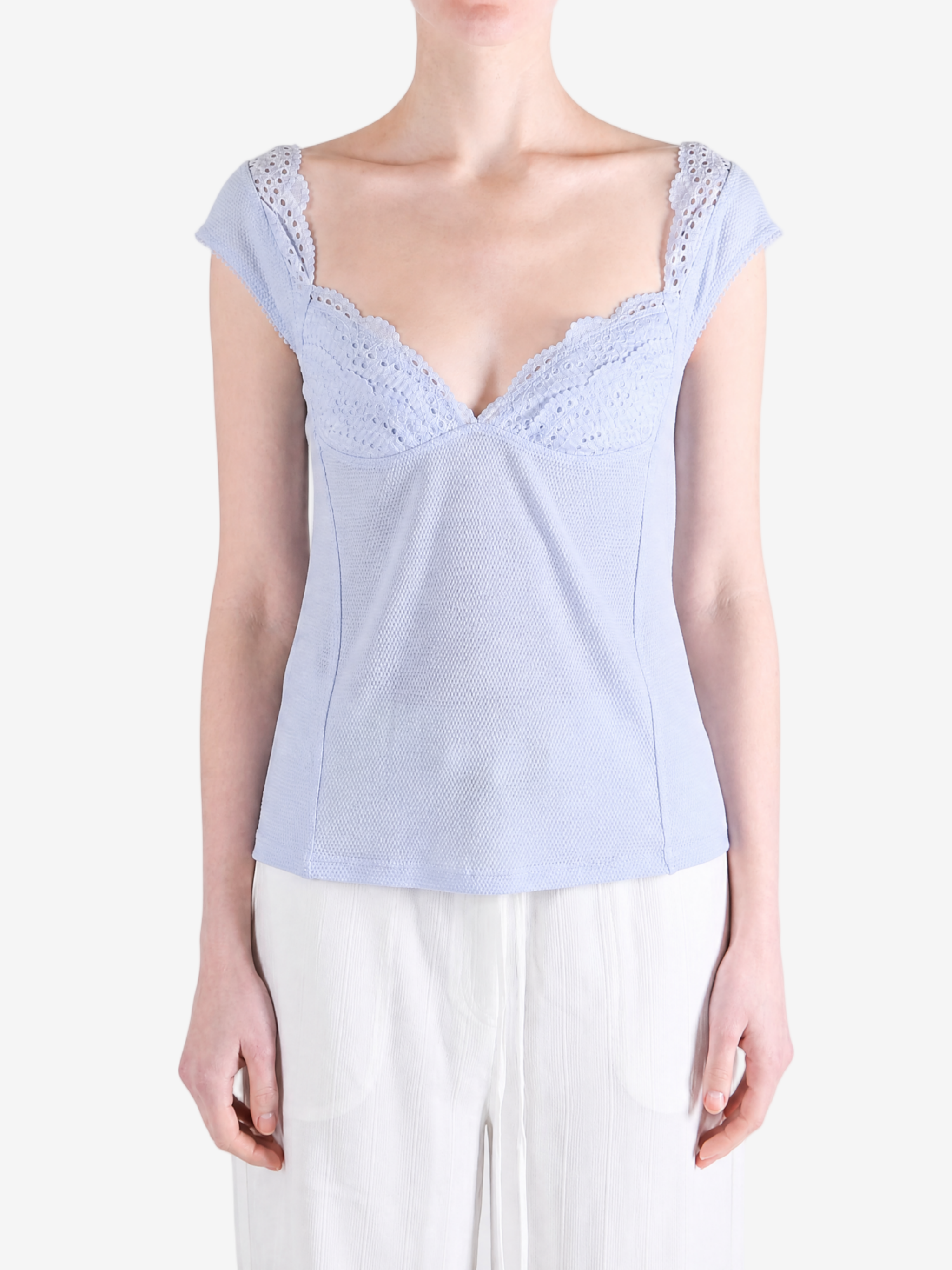 Blue t-shirt worn by a person, showing the t-shirt fit