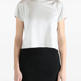 White t-shirt worn by a person, showing the t-shirt fit