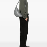 Grey bag worn by a person, showing the bag's fit