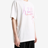 White t-shirt worn by a person, showing the t-shirt fit