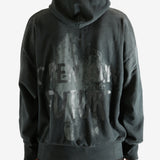 Black hoodie worn by a person, showing the hoodie's fit