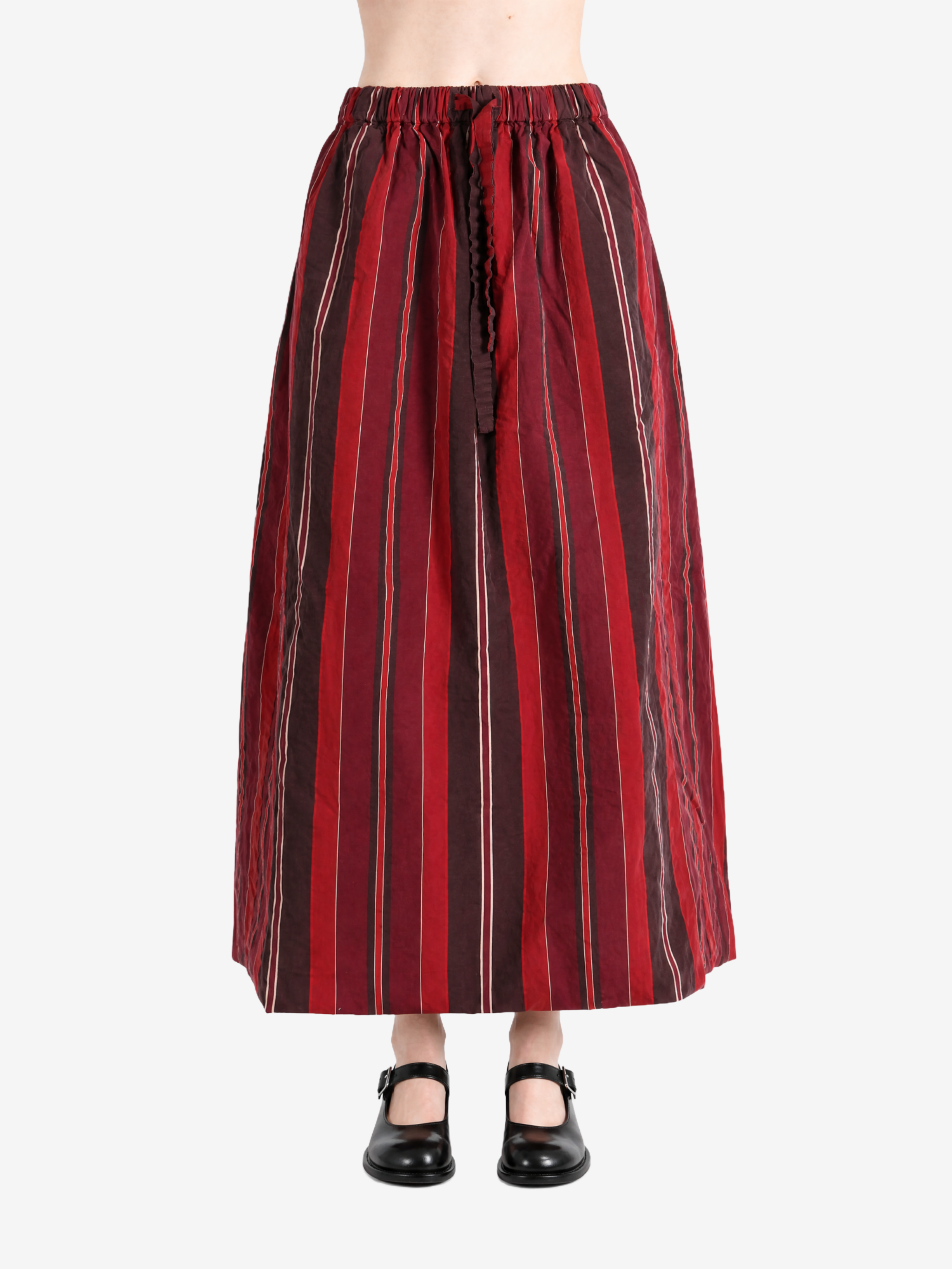 Red skirt worn by a person, showing the skirt fit