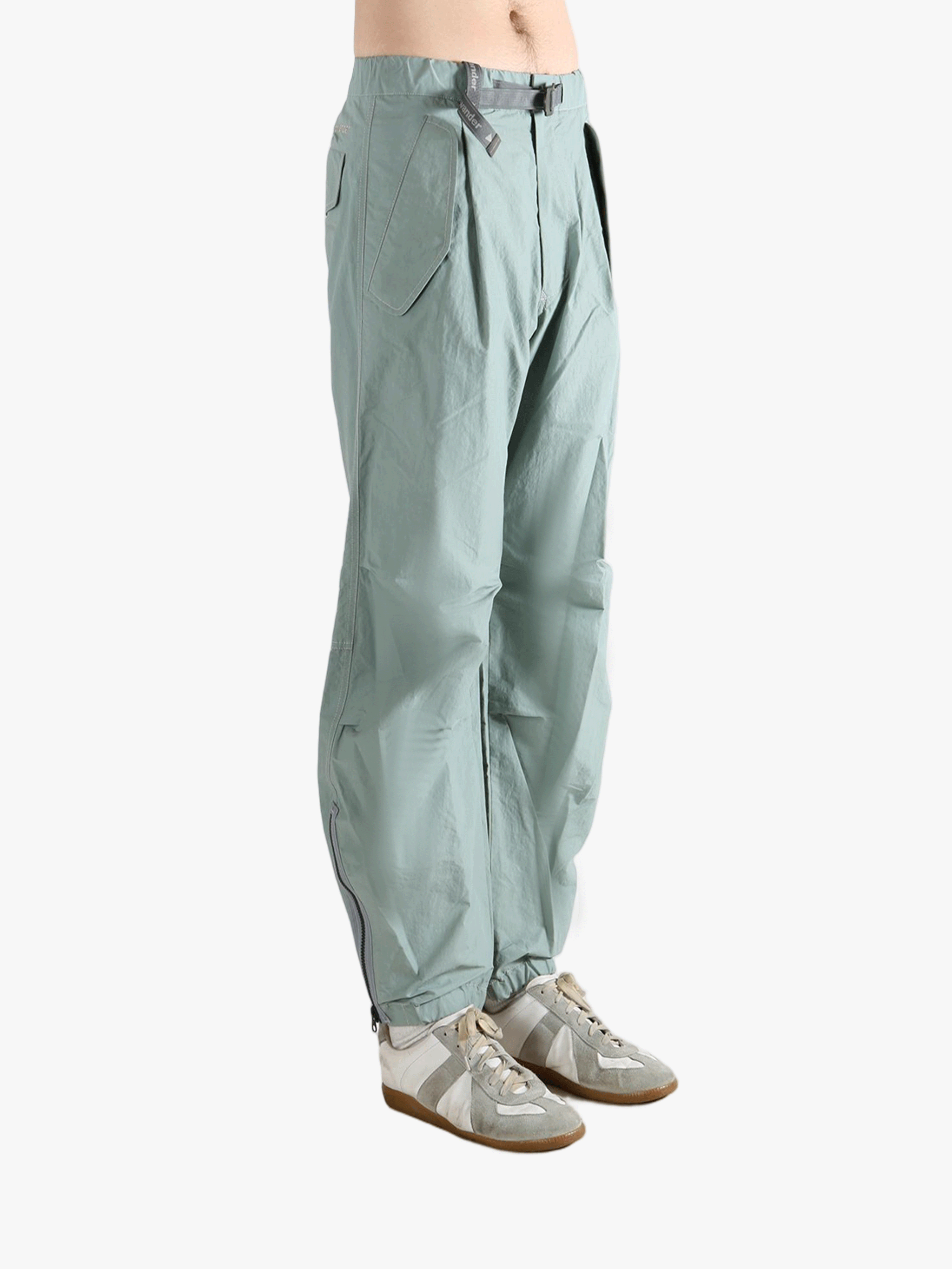 Blue pants worn by a person, showing the pants's fit
