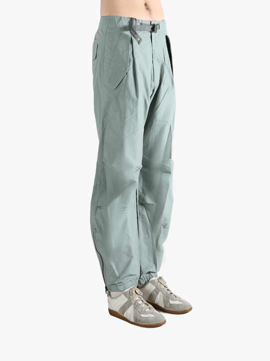 Blue pants worn by a person, showing the pants's fit