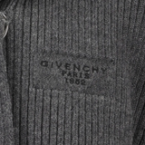 Close up of grey tops, showing texture of the wool and alpaca wool fabric