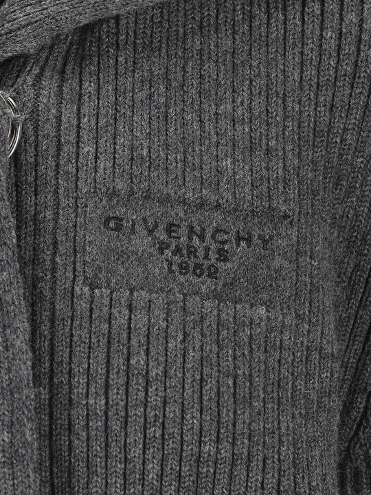 Close up of grey tops, showing texture of the wool and alpaca wool fabric