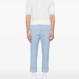 White t-shirt worn by a person, showing the t-shirt fit