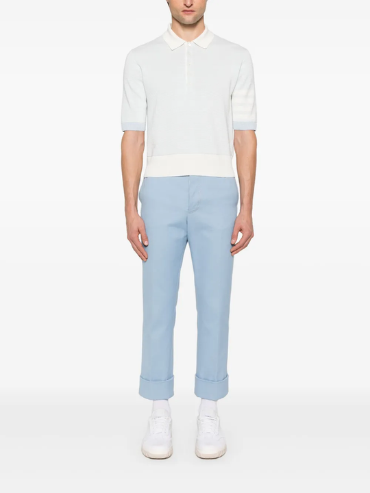 White t-shirt worn by a person, showing the t-shirt fit