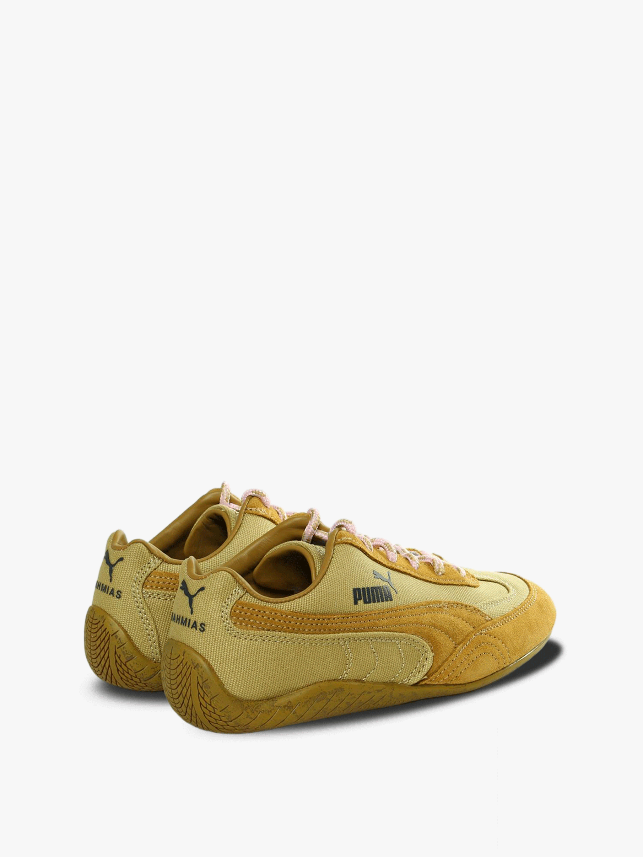 Yellow sneakers, back view
