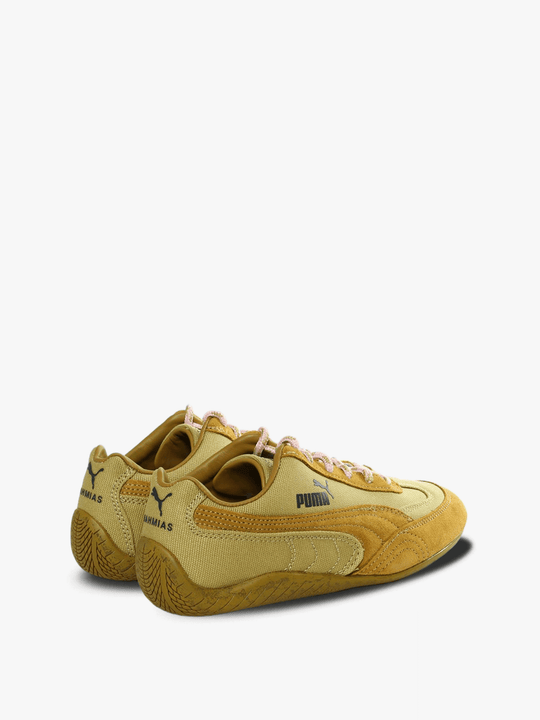 Yellow sneakers, back view