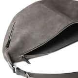 close up of grey bags, showing texture of the cow leather fabric