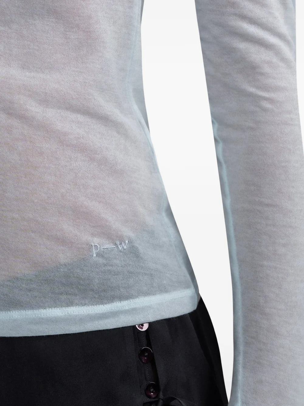Blue t-shirt worn by a person, showing the t-shirt fit