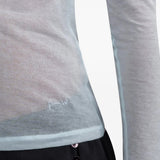 Blue t-shirt worn by a person, showing the t-shirt fit
