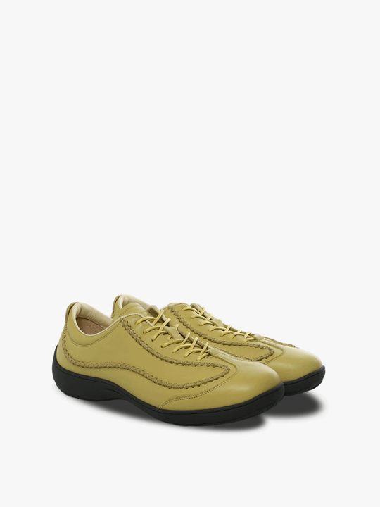 Yellow sneakers, side view