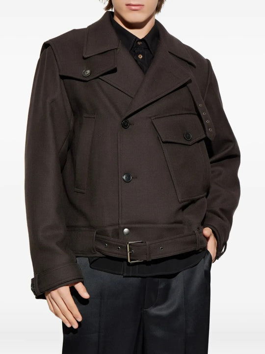 Brown jacket worn by a person, showing the jacket's fit