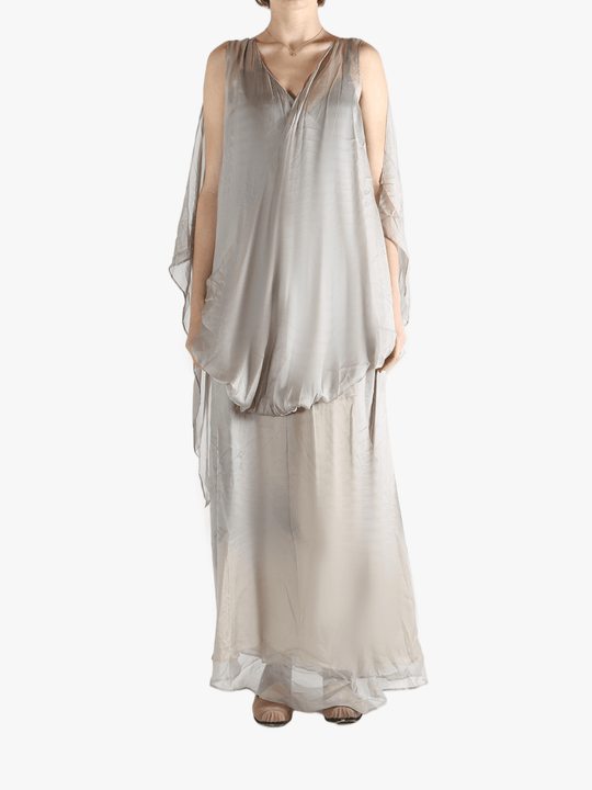 Silver dress worn by a person, showing the loose fit.