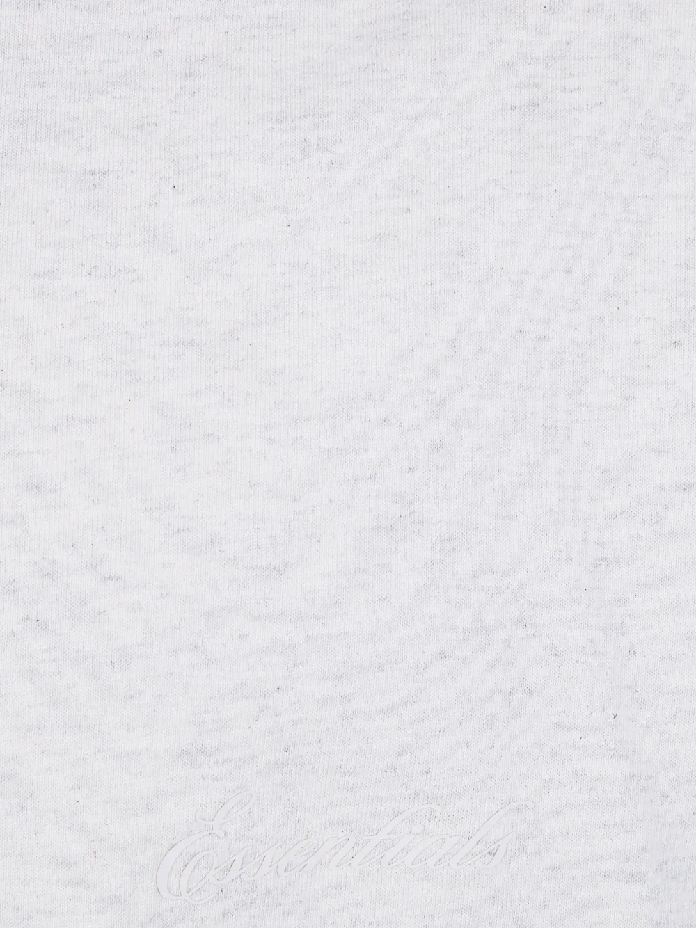 Close up of White t-shirt, showing texture of the cotton fabric