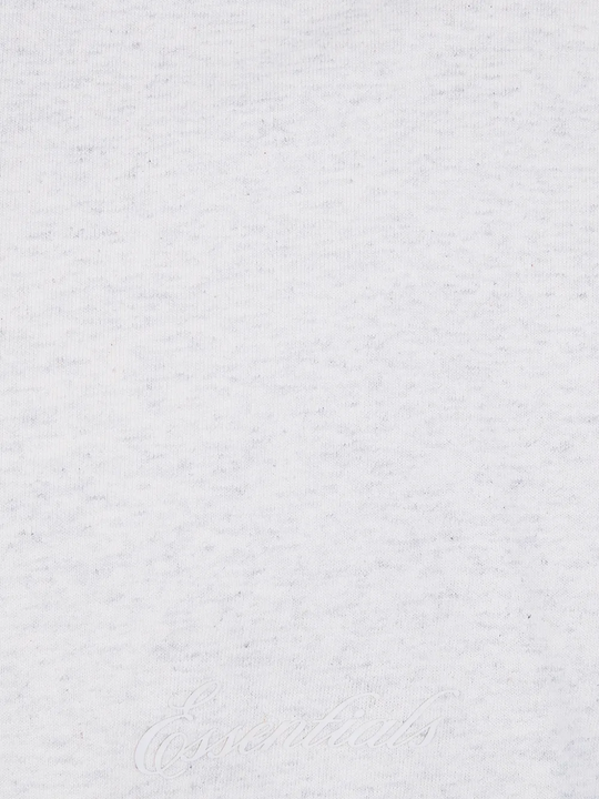 Close up of White t-shirt, showing texture of the cotton fabric