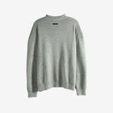 Grey knitwear, back view