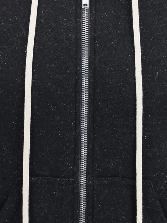 Close up of Black hoodie, showing texture of the 100% cotton fabric