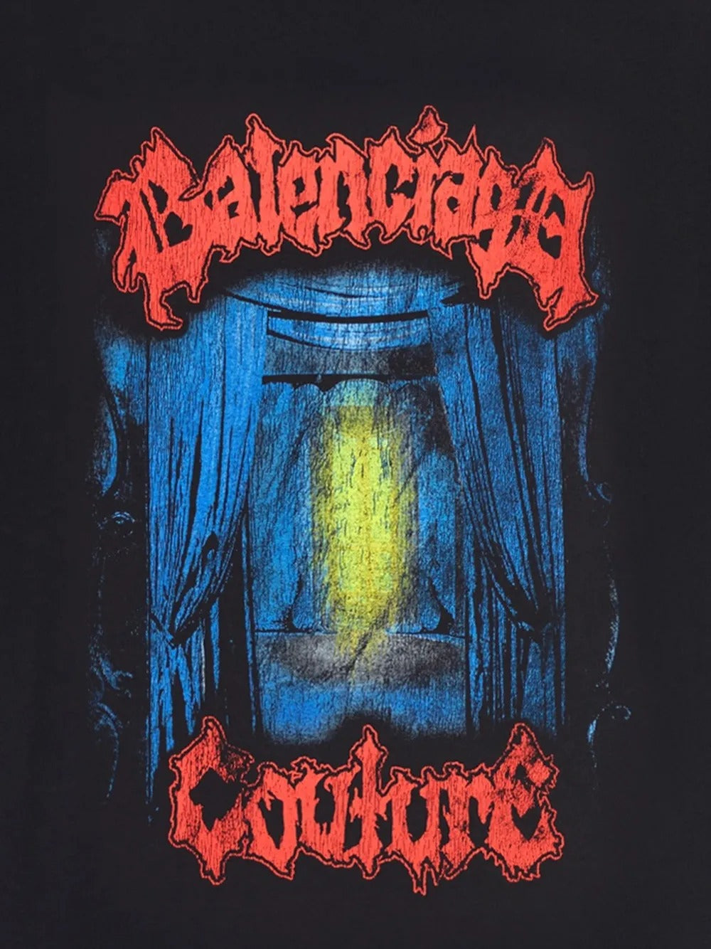 Close up of black t-shirts, showing texture of the cotton fabric