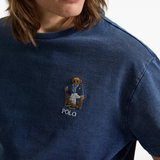 Blue t-shirt worn by a person, showing the t-shirt fit