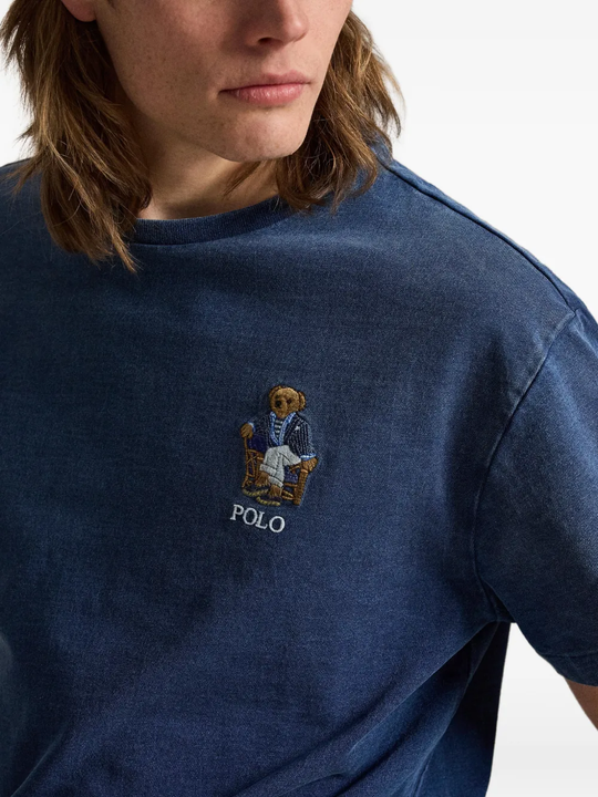 Blue t-shirt worn by a person, showing the t-shirt fit