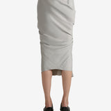 Grey skirt worn by a person, showing the skirt's fit