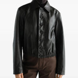 Black jacket worn by a person, showing the jacket fit