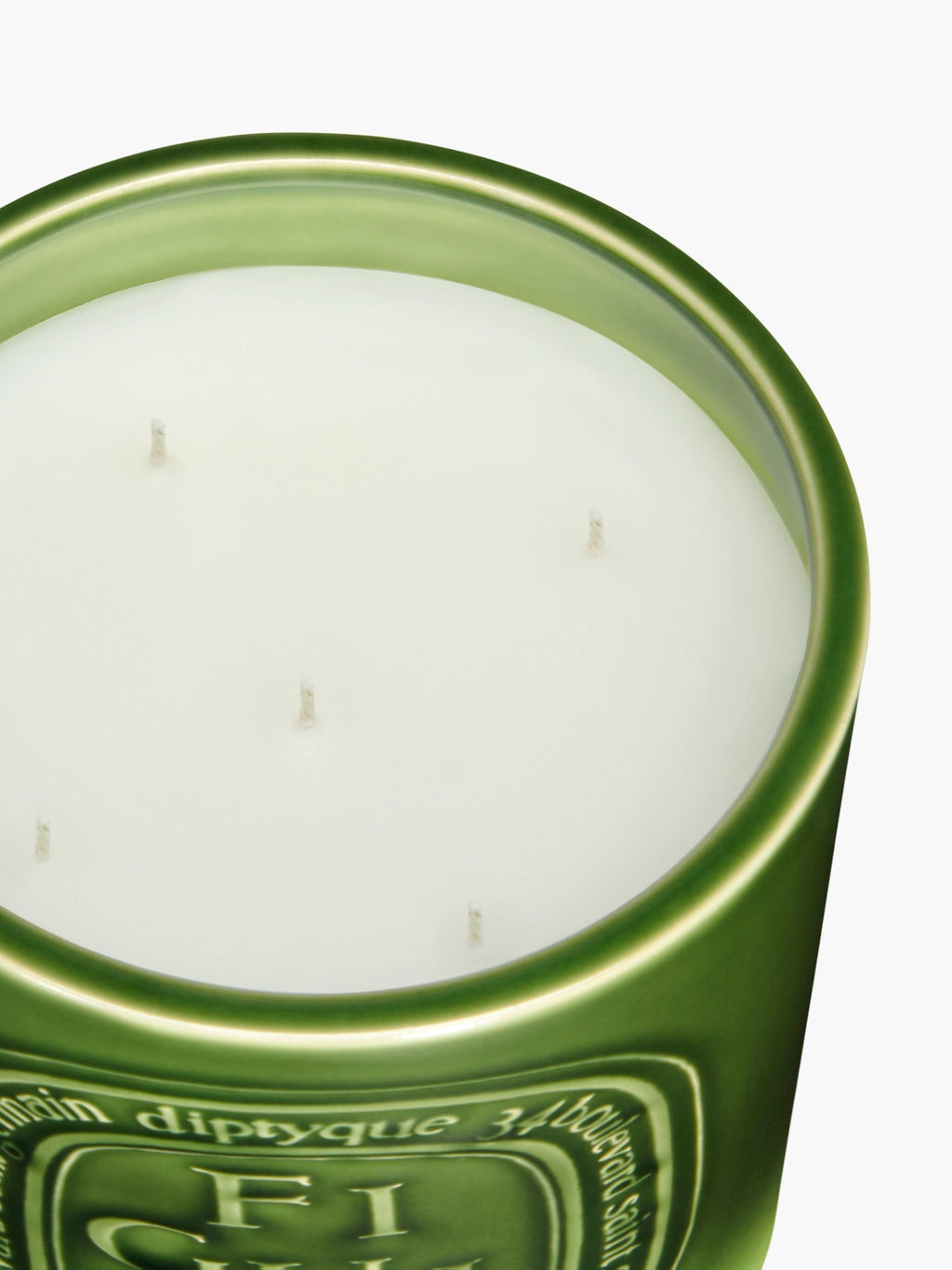 Close up of the candle, showing texture of the wax fabric