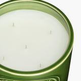 Close up of the candle, showing texture of the wax fabric