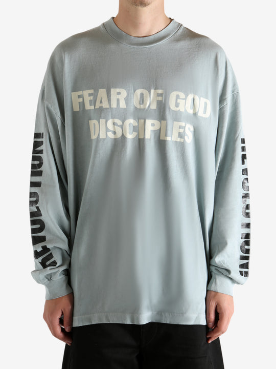 white shirts worn by a person, showing the shirts fit